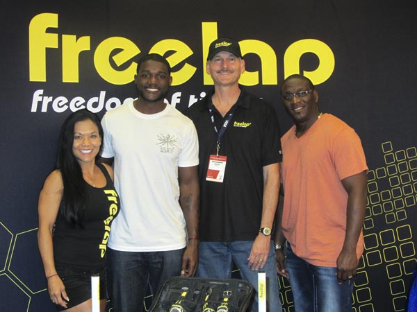 Justin Gatlin and Dennis Mitchell visit the Freelap booth