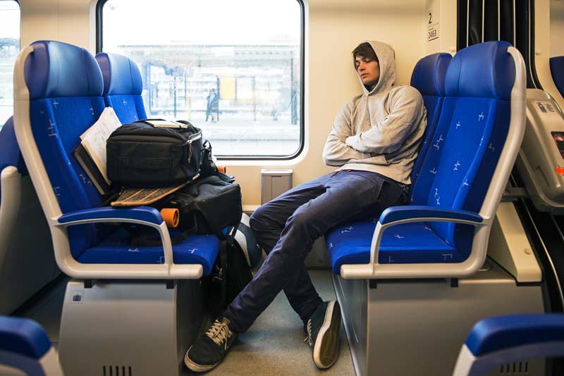 Athlete Napping on Train