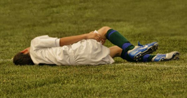 Soccer player with hamstring injury