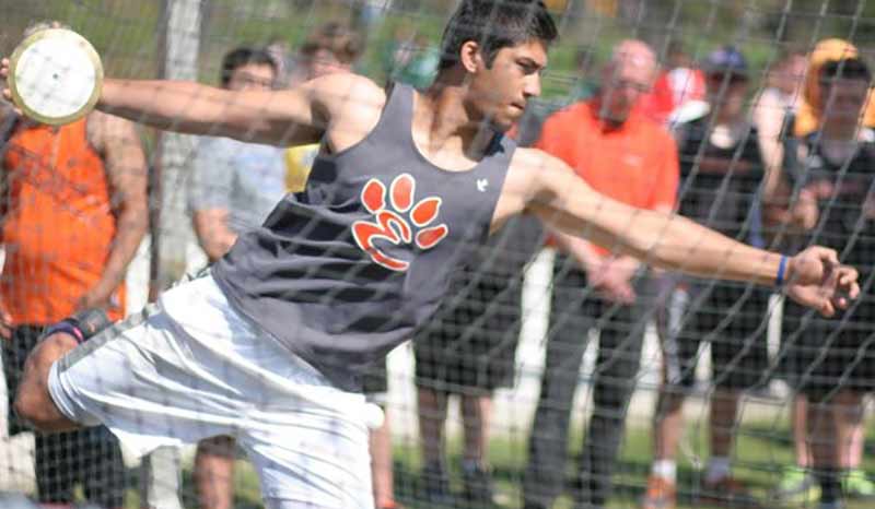 High School Athlete Throwing the Discuss