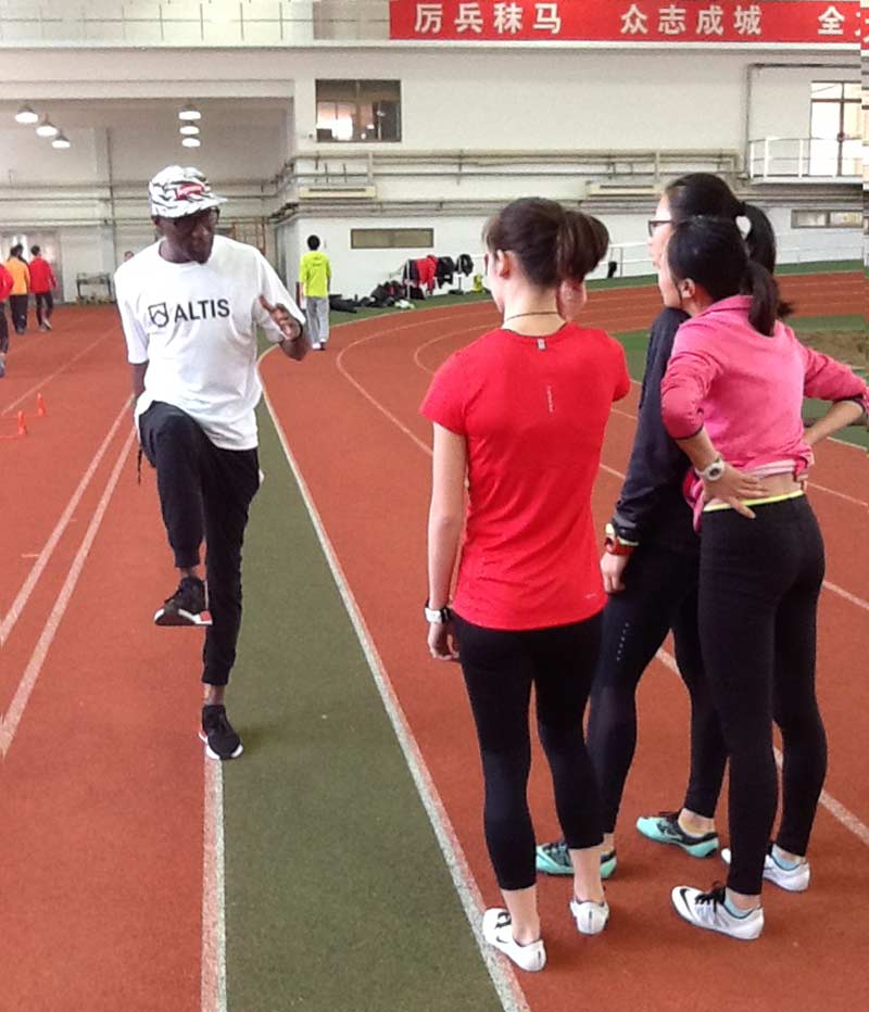 ALTIS Coach Rohsaan Griffin training athletes in China.